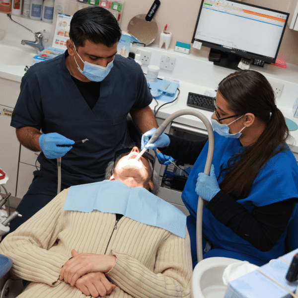 Dr Asad and our dental nurse during a dental hygiene appointment in Leicester